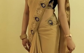 HOT GIRL SAREE WEARING and Showing her Belly button and BACK